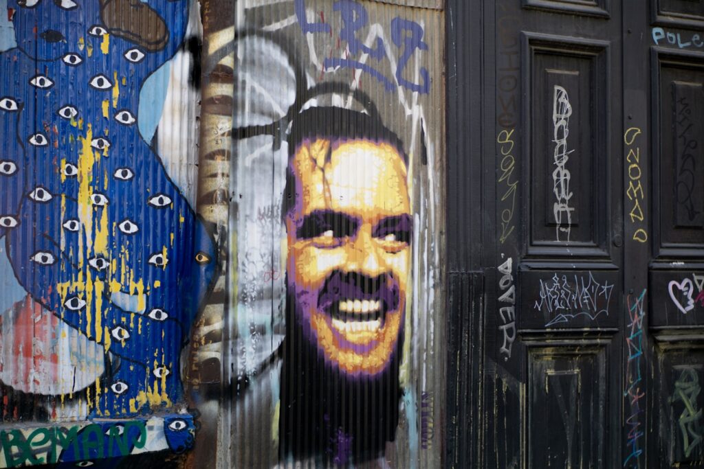 The Shining street mural graffiti art on a wall in the streets of Valparaiso, Chile.